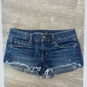 American Eagle Low Rise Shorty Distressed Denim Cutoff Women 4 Shorts Frayed Hem